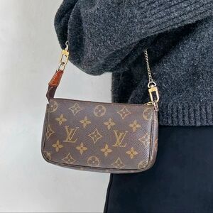 Louis Vuitton Mini Pochette Accessoires Monogram Wristlet